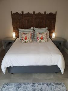 Кровать или кровати в номере Waterkloof Glen Flatlet