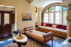 A seating area at In Camera Art Boutique Hotel