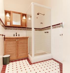 a bathroom with a shower and a sink at Beehive 14 in Mount Buller