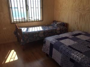 Cama o camas de una habitación en Costanera los Molinos
