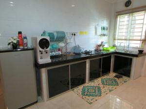 Dapur atau dapur kecil di GM HOMESTAY KELIBANG