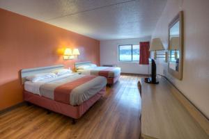 Ένα ή περισσότερα κρεβάτια σε δωμάτιο στο Motel 6-Branford, CT - New Haven
