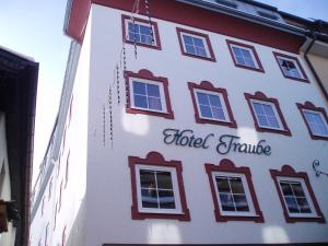a building with the words hotel brule on it at Hotel Traube in Zell am See