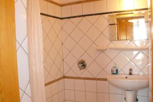 Koupelna v ubytování Hungaria Guesthouse + 32 fotografií