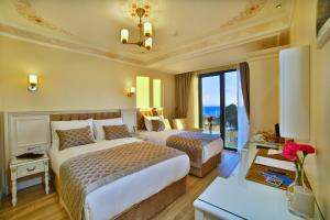 Ein Bett oder Betten in einem Zimmer der Unterkunft Yılsam Sultanahmet Hotel