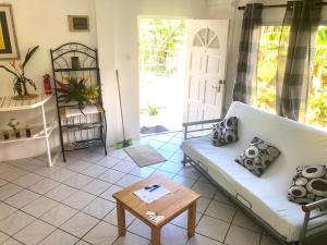 a living room with a couch and a coffee table at Diamondview in Soufri&egrave;re