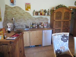 A kitchen or kitchenette at Ferienwohnungen Fritz