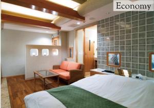 Postel nebo postele na pokoji v ubytování Hotel New York (Adult Only)