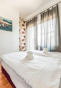 Cama o camas de una habitación en Apartments Tepavac