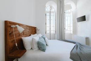 Postel nebo postele na pokoji v ubytování GuestMar