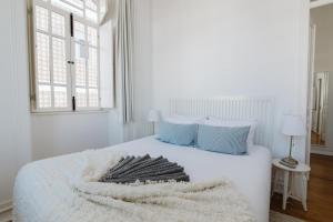 Postel nebo postele na pokoji v ubytování GuestMar