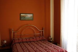 A bed or beds in a room at I Cavalieri di Malta
