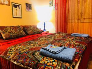 Katil atau katil-katil dalam bilik di Cottage Gole Alcantara Gloria Room