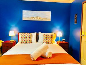 Кровать или кровати в номере Aussie Rest Motel