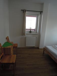 Postel nebo postele na pokoji v ubytování Apartment Vlčice u Trutnova