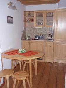 Kuchyň nebo kuchyňský kout v ubytování Apartmány pod věží