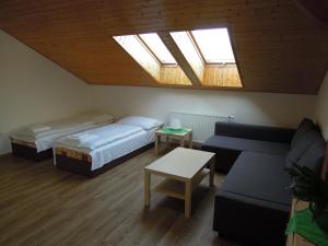 Postel nebo postele na pokoji v ubytování Apartment Vlčice u Trutnova