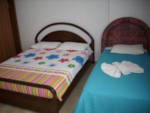 Cama o camas de una habitación en Çeşme Vural Apart Hotel