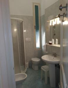 Ванна кімната в Hotel Lucciola
