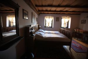 Postel nebo postele na pokoji v ubytování Apartmány pod věží