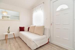 Postel nebo postele na pokoji v ubytování Apartments Ilija 1363