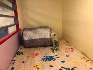 Letto o letti in una camera di Kai Cheng Inn 旅館134