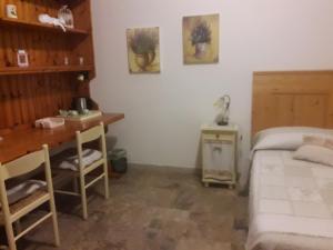 Posteľ alebo postele v izbe v ubytovaní B&BLa collina dei ciliegi