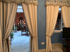 TV a/nebo společenská místnost v ubytování Casa Palacio Jerezana