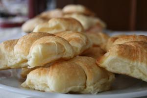 a plate of croissants sitting on a table at El Aguila del Tuyu in San Clemente del Tuyú