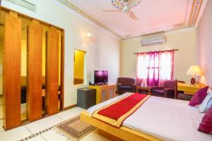 Postel nebo postele na pokoji v ubytování Hotel Shalimar