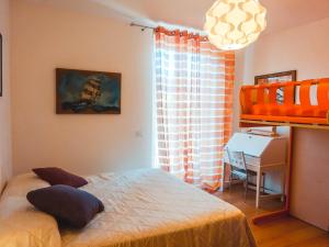 Postel nebo postele na pokoji v ubytování Guest House Le Acacie