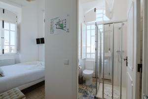 Postel nebo postele na pokoji v ubytování GuestMar