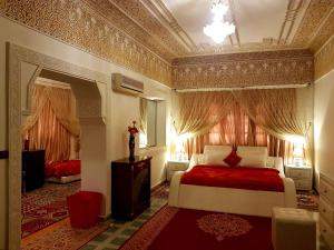 Riad Jasmine Sud tesisinde bir odada yatak veya yataklar