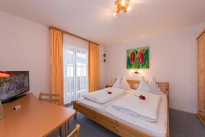 Postel nebo postele na pokoji v ubytování Haus Schwab