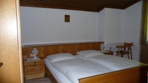 En eller flere senge i et værelse på Haus Rieder Georg
