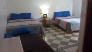 Postel nebo postele na pokoji v ubytování Yucatan Vista Inn Guest House