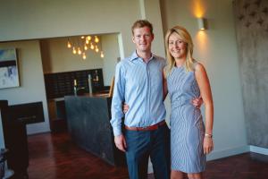 a man and a woman posing for a picture at The Old Schoolhouse Inn in Comber