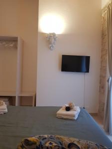 A television and/or entertainment centre at PIETRAVIVA