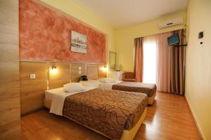 Krevet ili kreveti u jedinici u okviru objekta Socrates Hotel