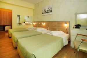 Krevet ili kreveti u jedinici u okviru objekta Socrates Hotel