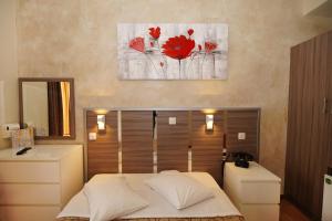 Krevet ili kreveti u jedinici u okviru objekta Socrates Hotel