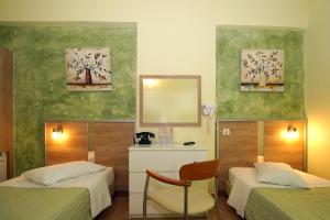 Krevet ili kreveti u jedinici u okviru objekta Socrates Hotel