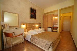 Krevet ili kreveti u jedinici u okviru objekta Socrates Hotel