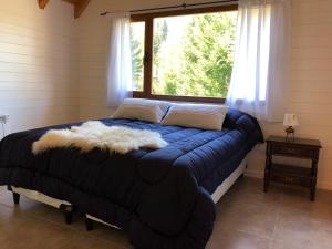 מיטה או מיטות בחדר ב-La lucinda