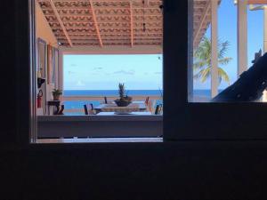 Habitación con vistas al océano desde una casa en Pousada Via Brasil, en Morro de São Paulo