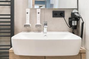 Koupelna v ubytování Hotel dasPaul