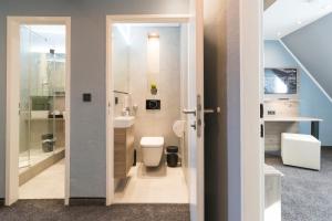 Koupelna v ubytování Hotel dasPaul