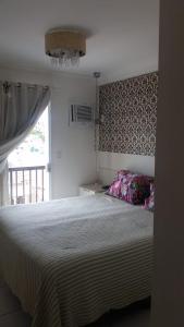 Llit o llits en una habitació de Apartamento Frente Mar