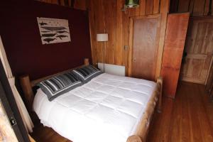 Voodi või voodid majutusasutuse Hotel Mitos toas