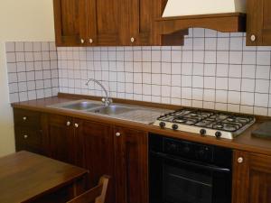 Kuchyňa alebo kuchynka v ubytovaní Etna Wine Azienda Agrituristica